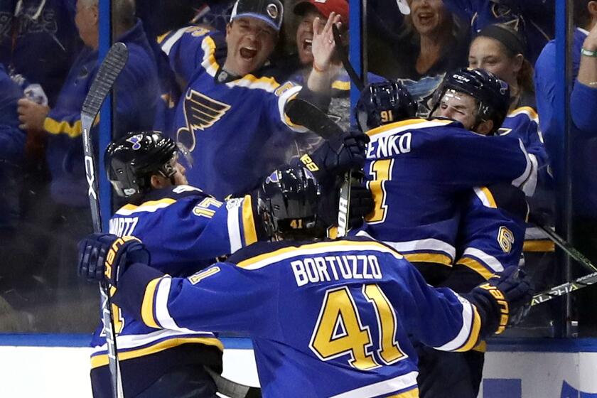 St. Louis Blues players celebrate after right wing Vladimir Tarasenko (91), of Russia, scored the winning goal against the Nashville Predators during the third period in Game 2 of an NHL hockey second-round playoff series Friday, April 28, 2017, in St. Louis. The Blues won 3-2 to even the series 1-1. (AP Photo/Jeff Roberson)