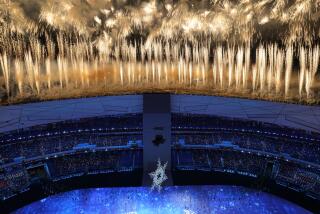 Fireworks light up the sky over Olympic Stadium during the opening ceremony of the 2022 Winter Olympics, Friday, Feb. 4, 2022, in Beijing. (AP Photo/Jeff Roberson)