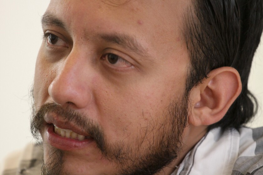 In this June 26 photo, Mexican photojournalist Ruben Espinosa speaks during an interview in Mexico City.