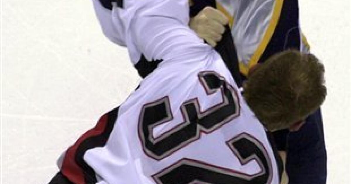 The NHL changed their fight rules to keep Rob Ray's shirt on