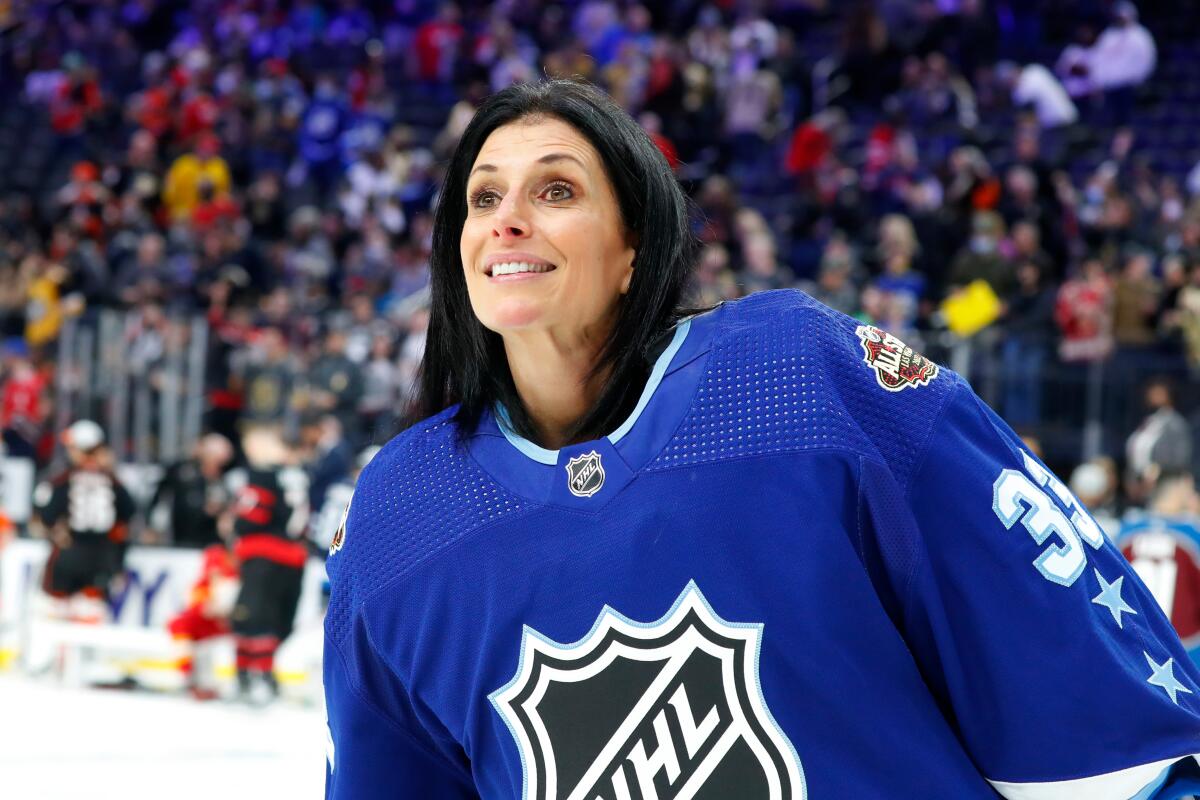 Manon Rheaume looks on during the NHL All-Star skills competition during the NHL All-Star weekend.