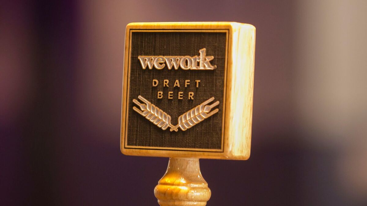 On tap beer is one of the amenities for WeWork members.