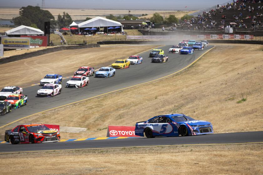 Kyle Larson (5) leads the field during a NASCAR Cup Series race, Sunday, June 6, 2021.