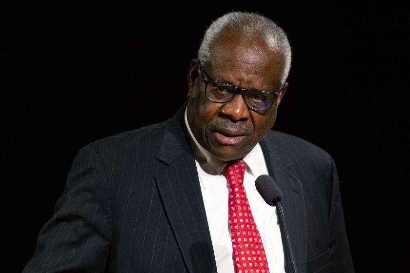 FILE - Supreme Court Justice Clarence Thomas speaks Sept. 16, 2021, at the University of Notre Dame in South Bend, Ind. Thomas says the Supreme Court has been changed by the leak of a draft opinion earlier this month. The opinion suggests the court is poised to overturn the right to an abortion recognized nearly 50 years ago in Roe v. Wade. The conservative Thomas, who joined the court in 1991 and has long called for Roe v. Wade to be overturned, described the leak as an unthinkable breach of trust. (Robert Franklin/South Bend Tribune via AP, File)