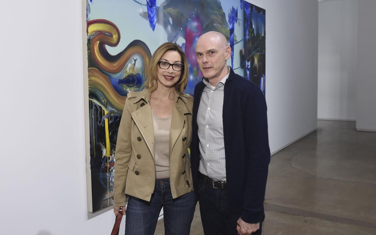 Sharon Lawrence and Tom LaDuke at the April 10 opening of his "Candles and Lasers" exhibition at the Kohn Gallery.