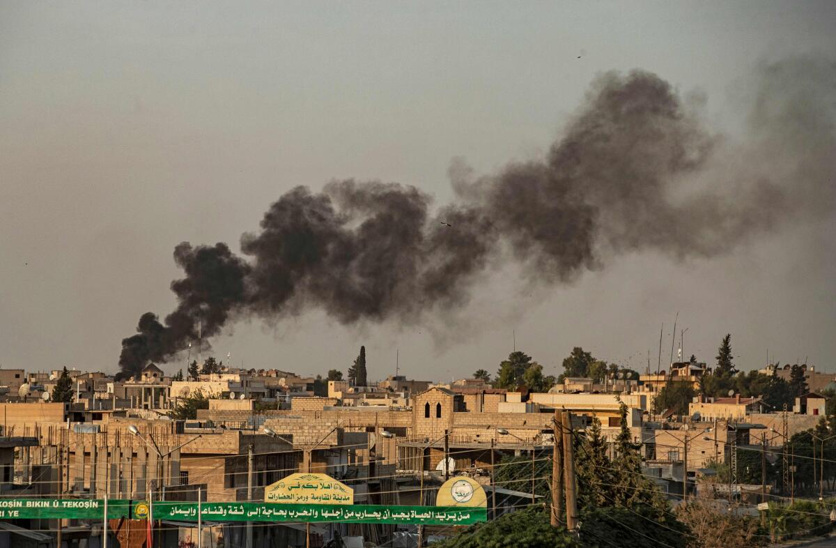 Smoke from Turkey's bombardment of Kurdish forces in Syria 