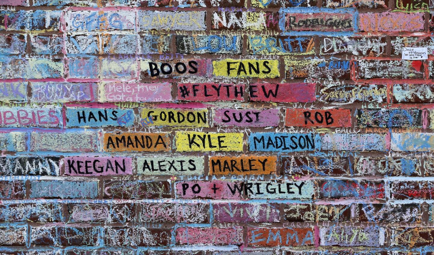 Chalk messages on the Wrigley Field wall