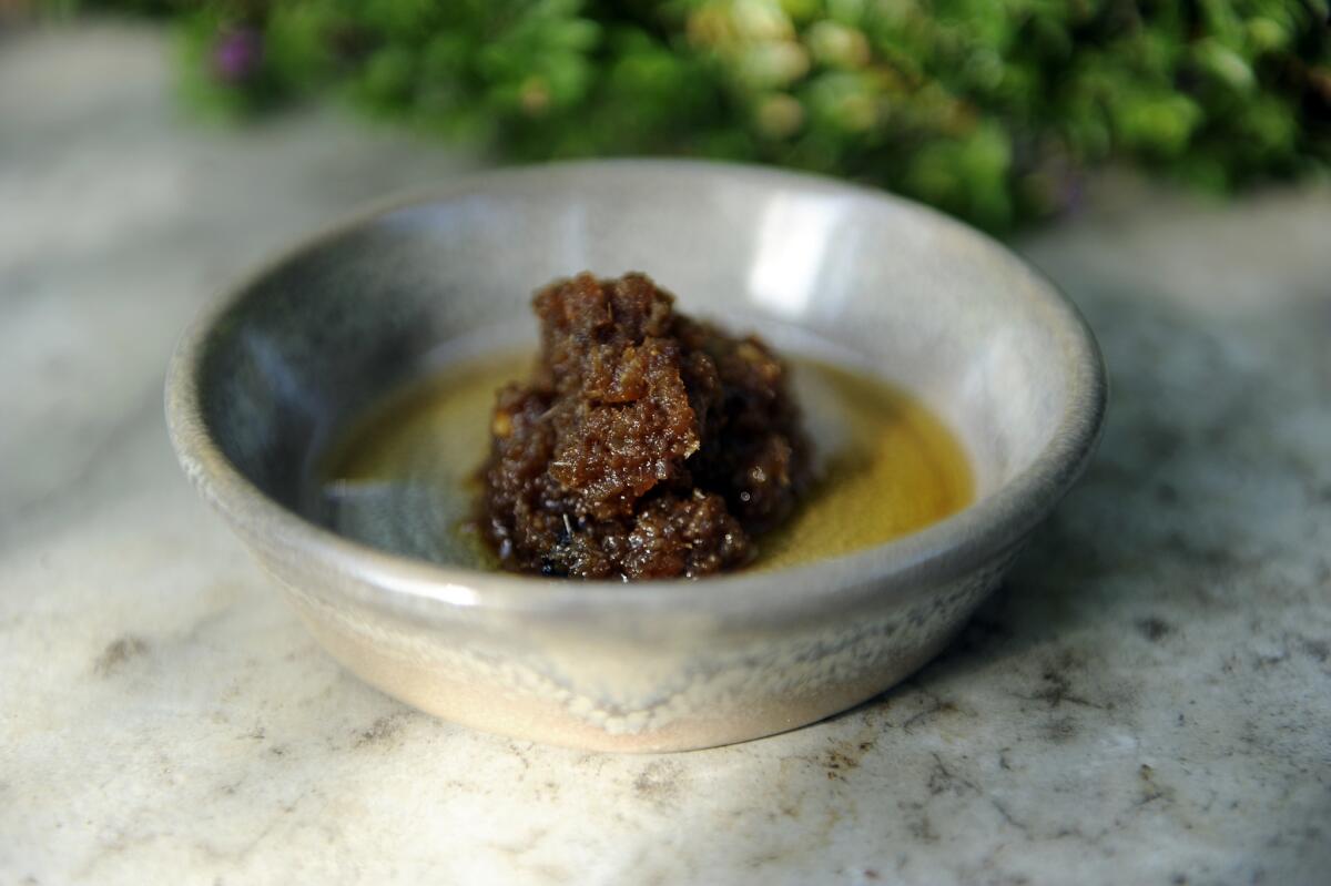 Chef Sang Yoon uses 15 ingredients to create his interpretation of Hong Kong's famous XO sauce.