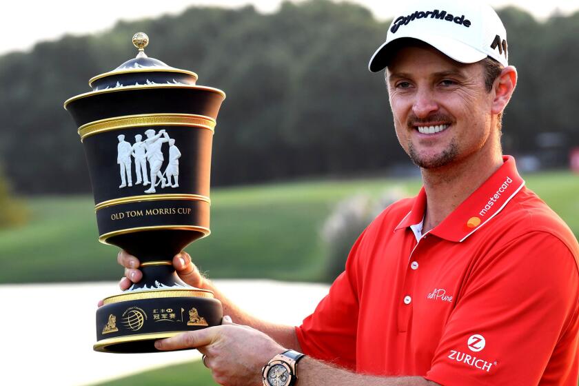Justin Rose of England poses with his trophy after he stormed back from eight shots behind overnight to win the USD9.75 million WGC-HSBC Champions by two strokes in a thrilling finale at the Sheshan International golf club in Shanghai on October 29, 2017. / AFP PHOTO / GOH CHAI HINGOH CHAI HIN/AFP/Getty Images ** OUTS - ELSENT, FPG, CM - OUTS * NM, PH, VA if sourced by CT, LA or MoD **