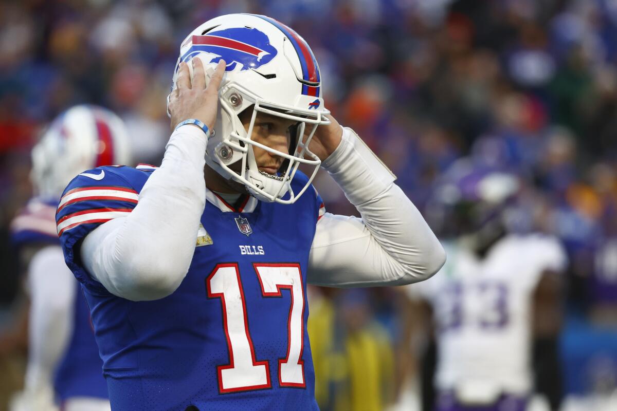 Buffalo Bills quarterback Josh Allen (17) reacts during the first half of  an NFL football game …