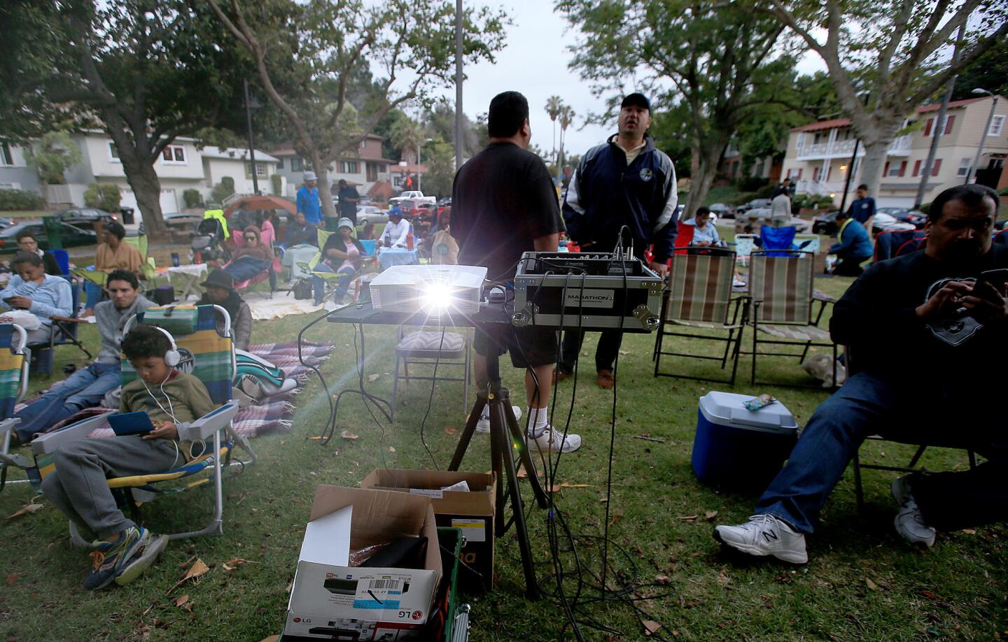 View Park residents gather in Monteith Park for a twilight showing of the movie "The Wiz."