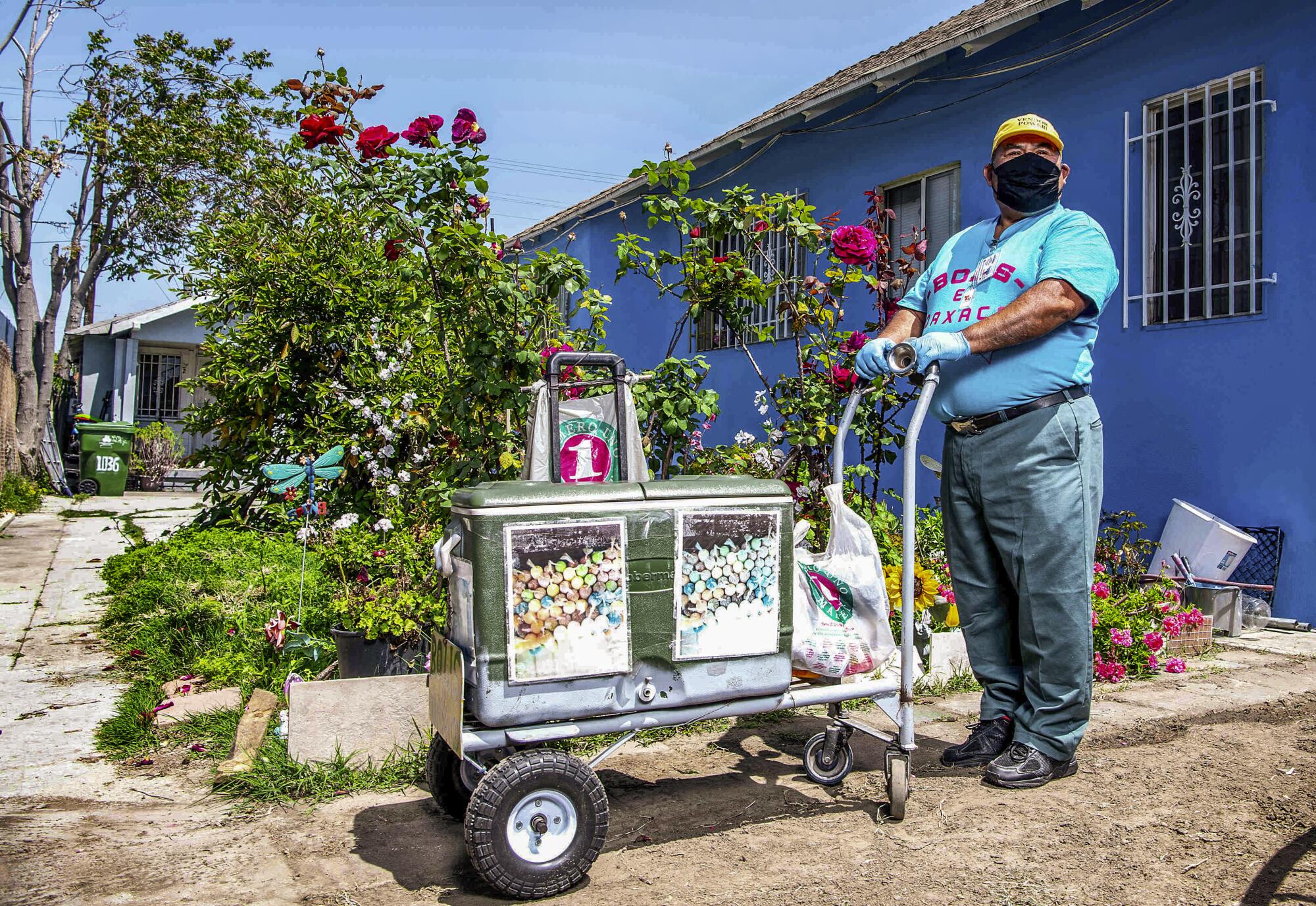 Faustino Martinez with a pushcart.