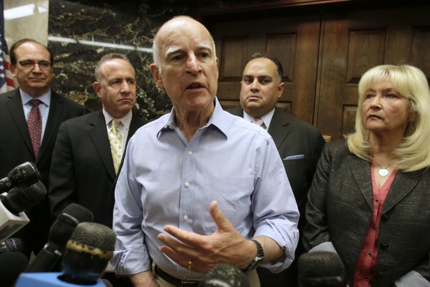 Gov. Jerry Brown, center, responds to a question concerning the compromise plan reached on reducing the state's prison population, during a Capitol news conference in Sacramento, Calif., Monday, Sept. 9, 2013. The deal reached between Brown and Senate Minority Leader Bob Huff, R-Diamond Bar, left, Senate President Pro Tem Darrell Steinberg, D-Sacramento, second from left, Assembly Speaker John Perez, D-Los Angeles, second from right and Assembly Minority Leader Connie Conway, R-Tulare, would be to request that a panel of federal judges extend the end-of-the-year deadline on releasing thousands of inmates. If the judges don't extend the deadline, the state will fall back on the Governor's plan to lease beds. (AP Photo/Rich Pedroncelli) ** Usable by LA and DC Only **