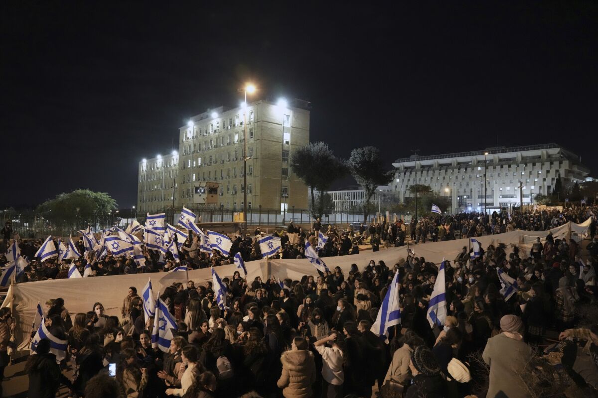 Thousands of Israeli nationalists protest outside the parliament building in Jerusalem on Jan. 13, 2022.  