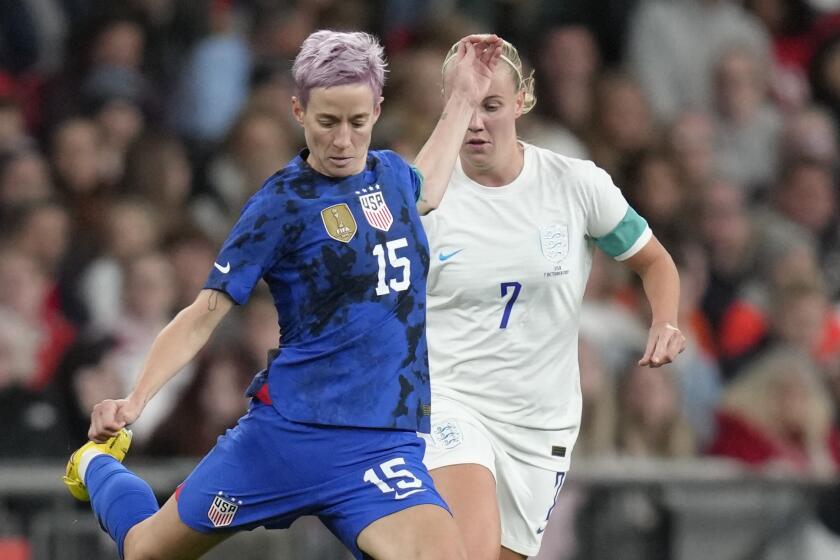 Megan Rapinoe of the United States makes her move during a match against England on Oct. 7.