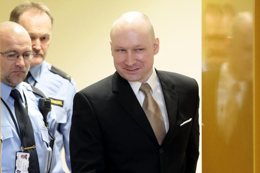 Anders Behring Breivik enters a courtroom in Skien, Norway, on March 15. He killed 77 people in a bomb and gun massacre in 2011.