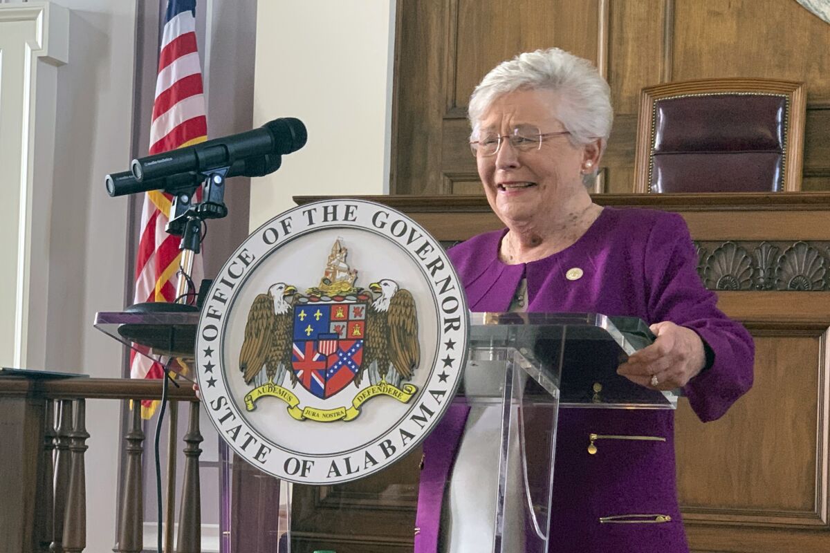FILE - Alabama Gov Kay Ivey announces that a statewide mask order will be extended through Oct. 2, 2020 during a press conference at the Alabama Capitol in Montgomery, Ala., on Thursday, Aug. 27, 2020. Alabama won't require background checks for concealed guns. Republican Gov. Kay Ivey quickly signed the measure into law., Thursday, March 10, 2022. (AP Photo/Kim Chandler, File)