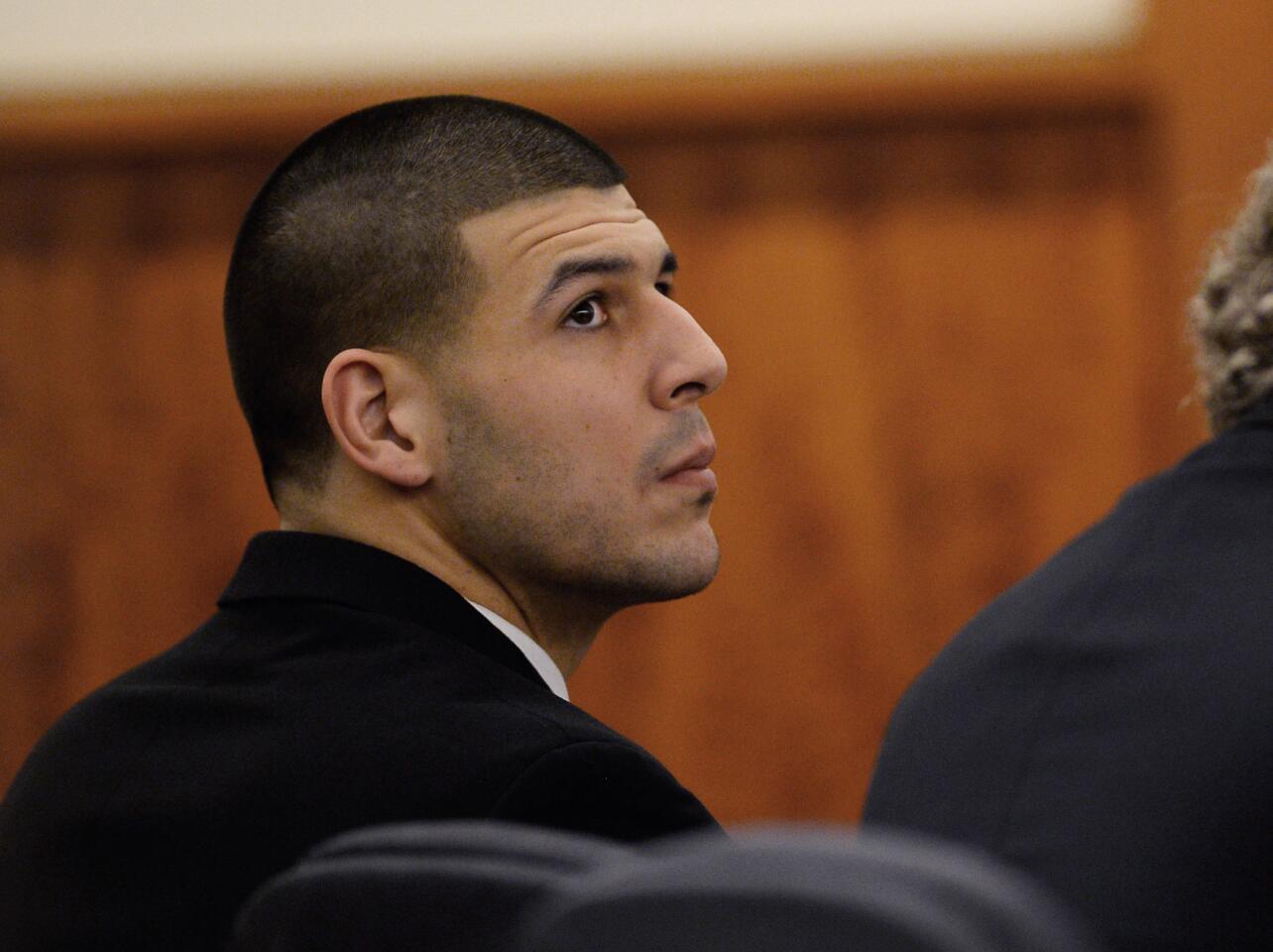 The 25-year-old was a star player with the Patriots with a $40 million contract when, prosecutors say, he killed Odin Lloyd. Hernandez has pleaded not guilty. He has also pleaded not guilty to murder charges stemming from a 2012 double slaying in Boston, where he is accused of killing two men after someone accidentally spilled a drink on him at a nightclub. No trial date is set in the Boston case, and prosecutors in the Lloyd case will not be allowed to tell the jury about the double slaying. - Associated Press