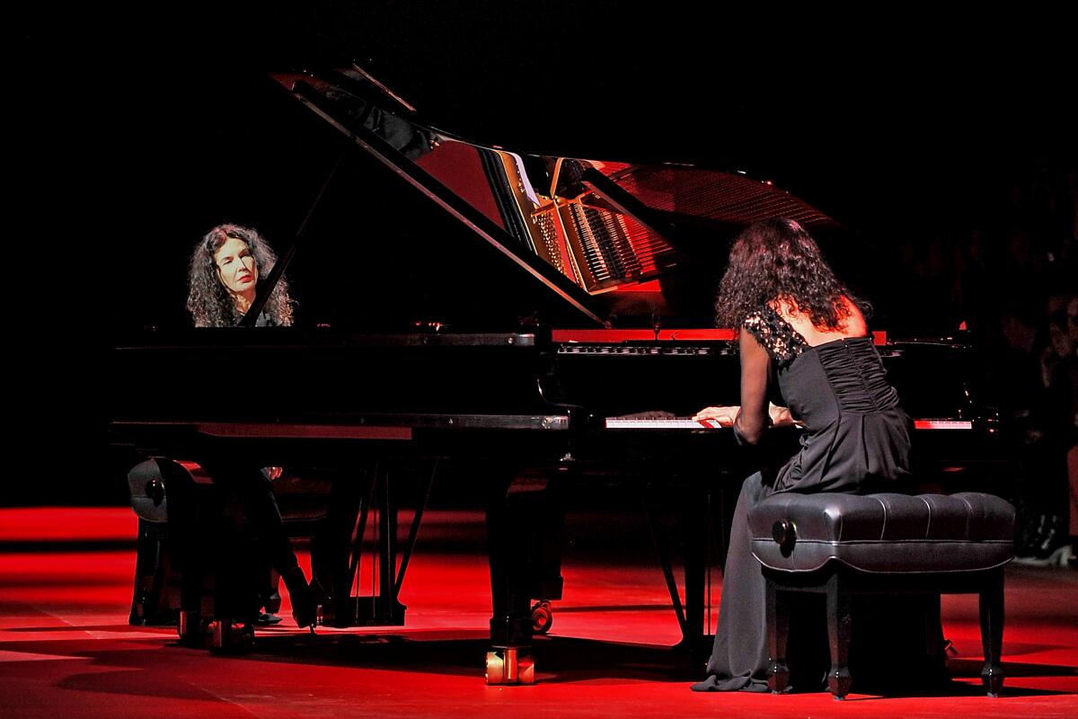 Sisters Katia Labeque, left, and Marielle Labeque perform