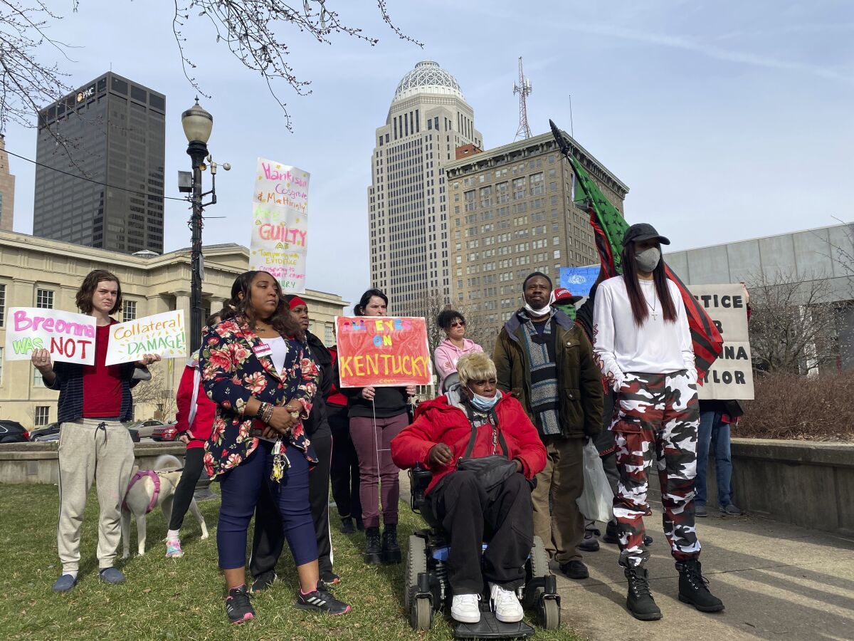 Demonstrators listen to speeches at a rally at Jefferson Square Park in downtown Louisville, Ky., Friday, March 4, 2022. A day earlier, a jury cleared former Louisville police Officer Brett Hankison of charges that he endangered neighbors when he fired shots into an apartment during the 2020 drug raid that ended with Breonna Taylor’s death. (AP Photo/Piper Hudspeth Blackburn)