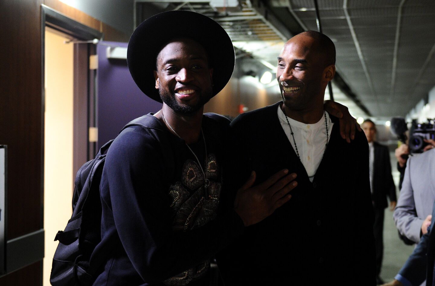 The Miami Heat's Dwyane Wade, left, and Kobe Bryant share a laugh after a game at Staples Center on March 30.