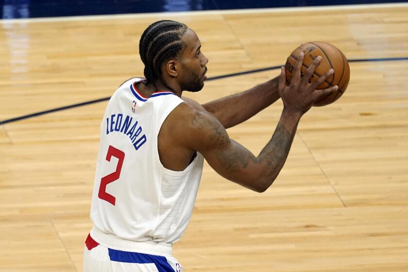 Los Angeles Clippers' Kawhi Leonard (2) plays against the Minnesota Timberwolves in an NBA basketball game, Wednesday, Feb. 10, 2021, in Minneapolis. (AP Photo/Jim Mone)