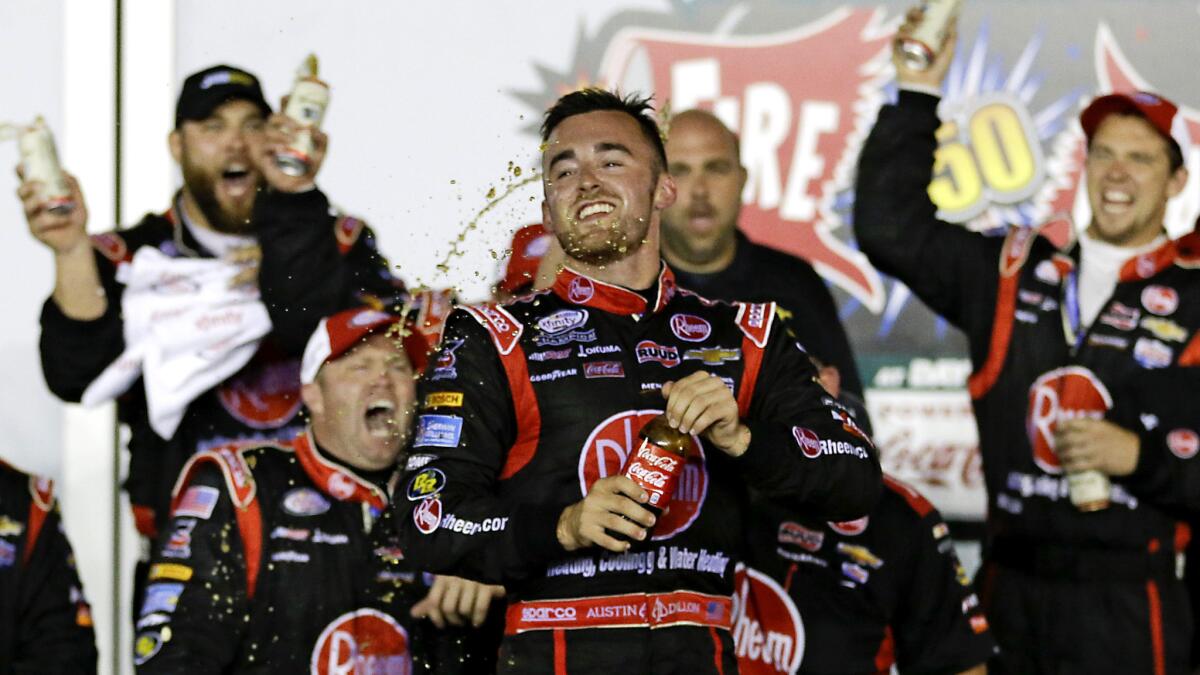 Austin Dillon celebrates in Victory Lane after winning the NASCAR Xfinity Series race at Daytona International Speedway on Saturday night.