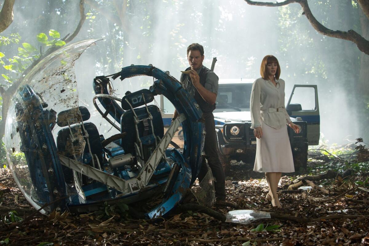 Chris Pratt and Bryce Dallas Howard assess the damage in "Jurassic World."