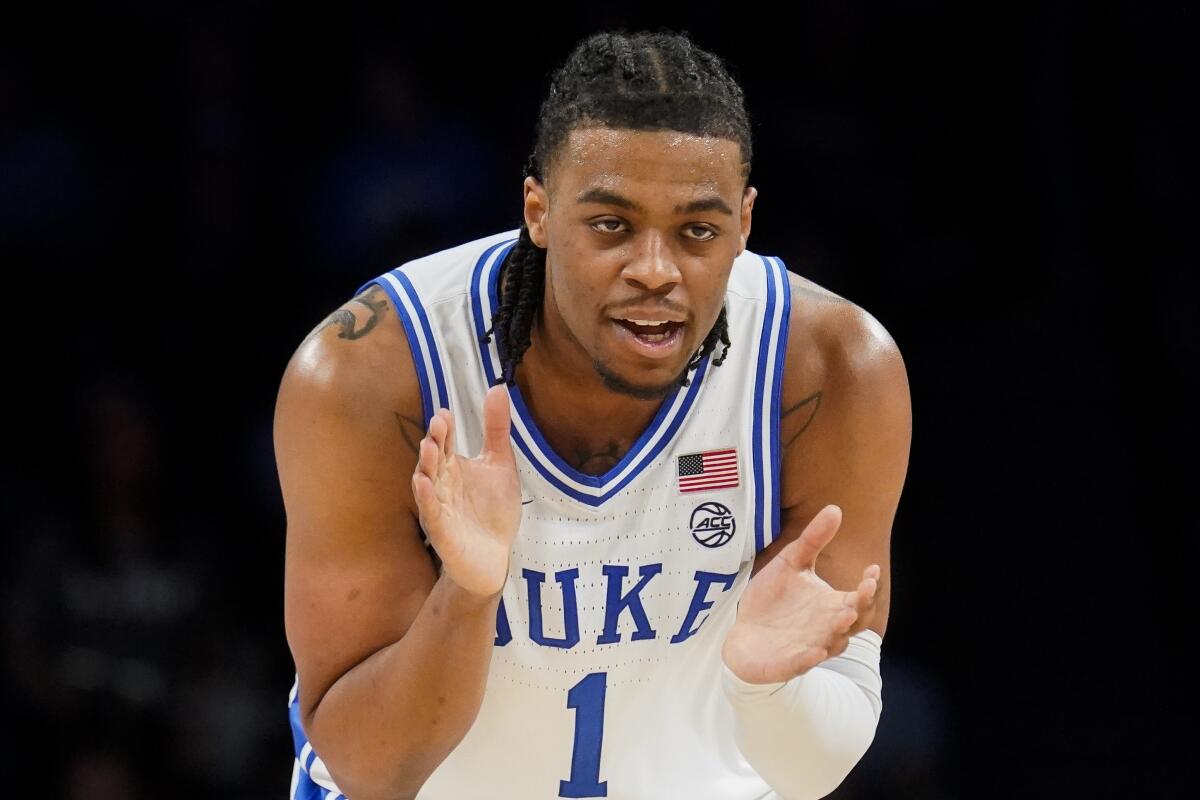 Duke's Trevor Keels claps during a win over Miami in the Atlantic Coast Conference tournament on March 11.