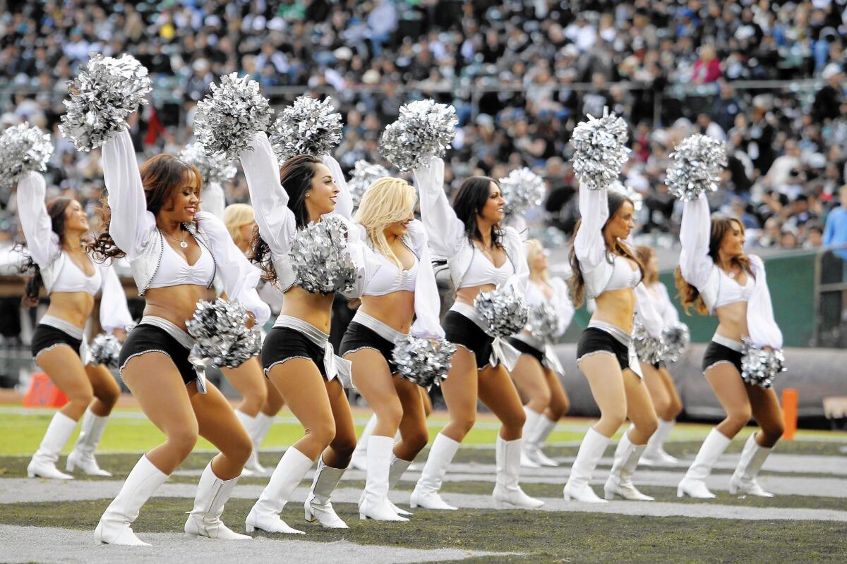 The Raiderettes doing what they love. (Now they'll get paid a bit more for it.)