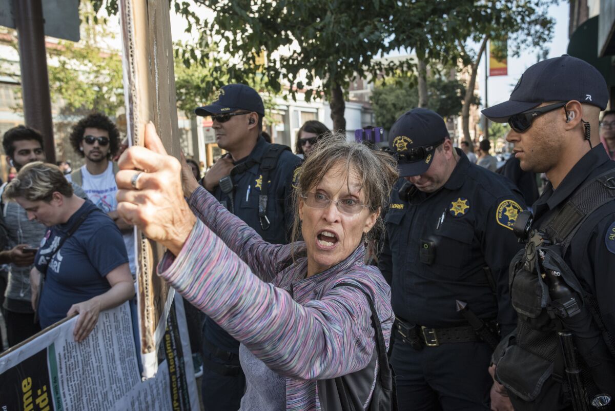 A protester demonstrates at UC Berkeley before a speech by conservative writer Ben Shapiro.