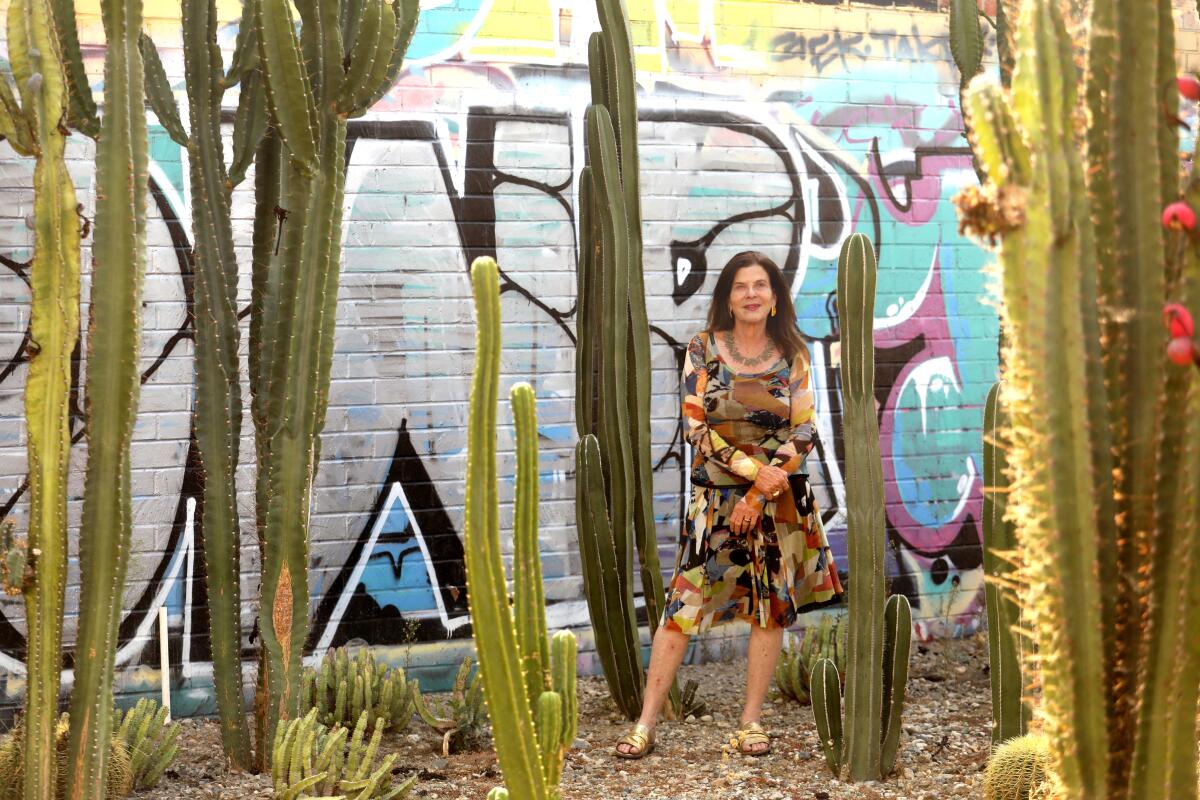 Landscape designer Mia Lehrer, founder of Studio-MLA, stands in a cactus garden adjacent to her studio