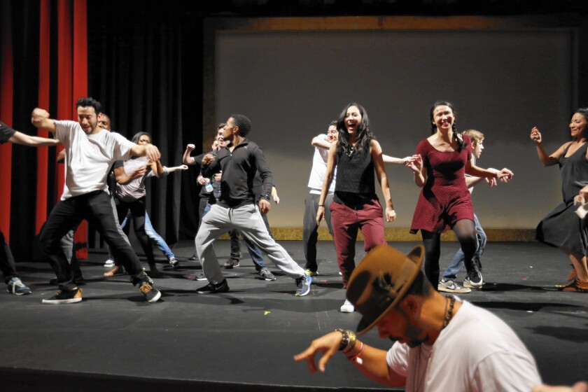 The Multi-Ethnic Coalition plans to meet with the major movie studios in an effort to boost the number of minorities working at all levels of the film business. Above, cast members rehearse before CBS’ diversity showcase at El Portal Theater in January 2015.