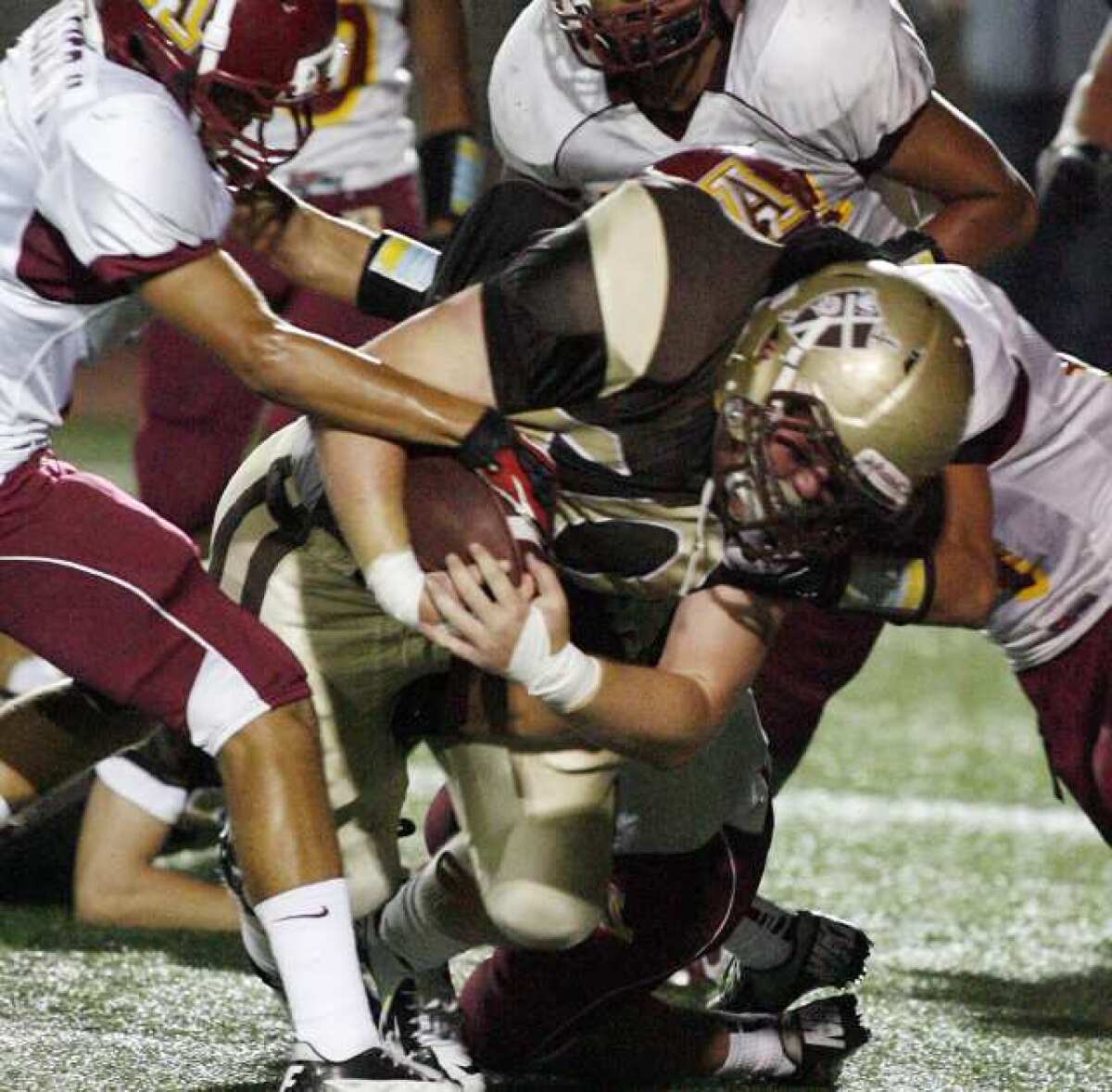 St. Francis' Austin Finton leans toward the goal line in a season-opening win over Arcadia. The Golden Knights prepare for Monrovia this week.