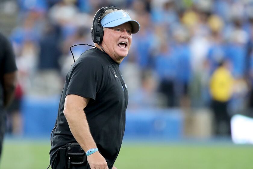 PASADENA, CALIF. - OCT. 23, 2021. UCLA head coach Chip Kelly on the sidelines.
