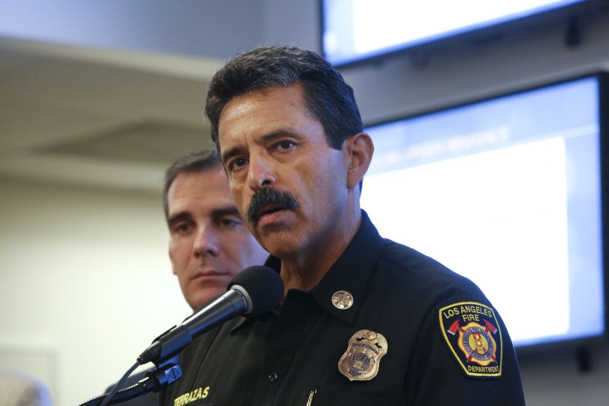 Los Angeles Fire Department Chief Ralph Terrazas and Mayor Eric Garcetti, left, at a news conference in 2014.