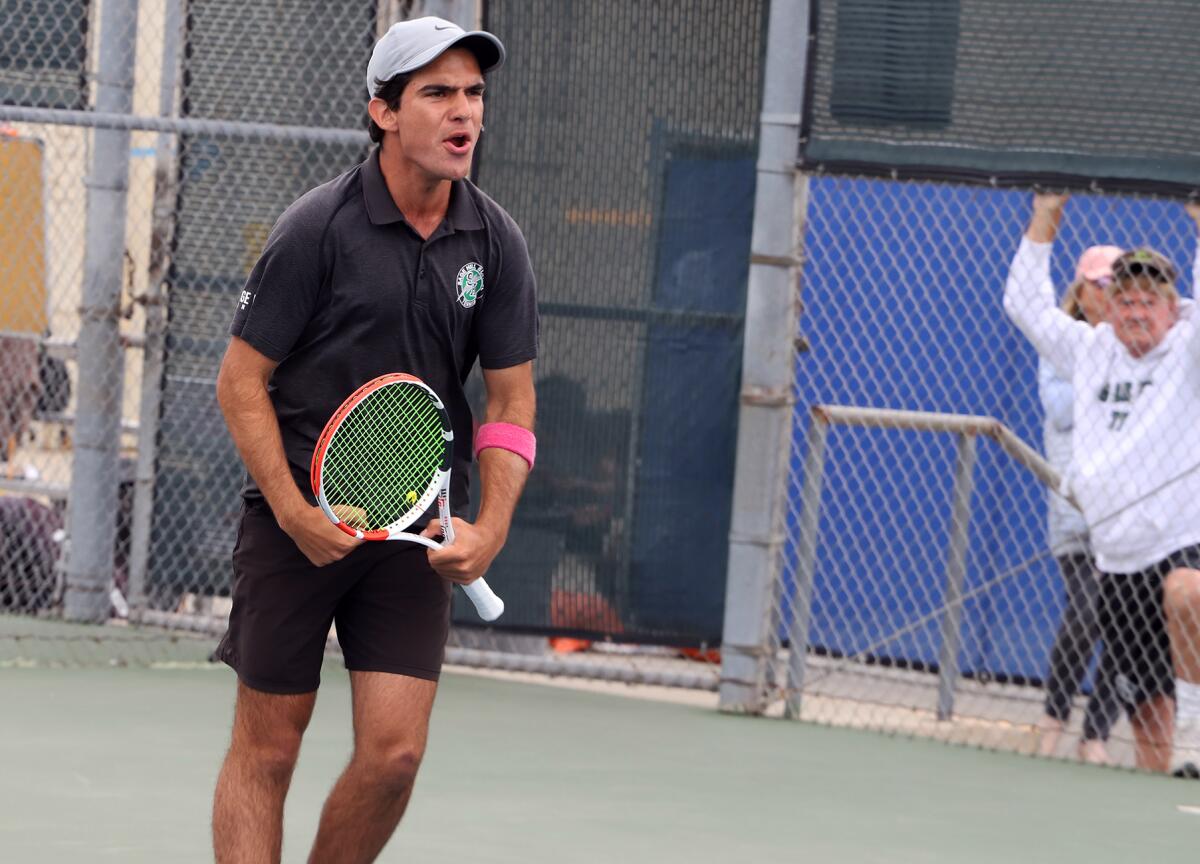 Sage Hill doubles player Shaan Sakraney celebrates after winning a set against Ayala in Wednesday's match.