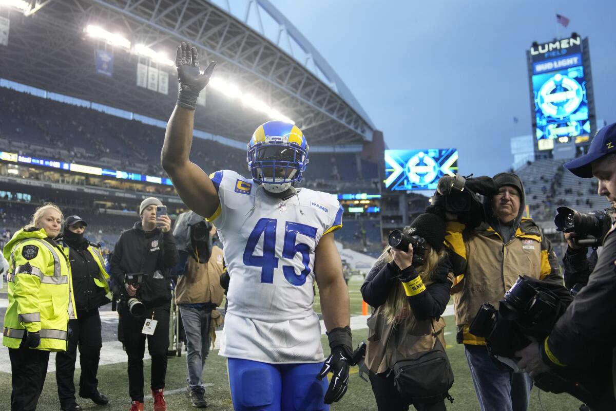 Rams linebacker Bobby Wagner waves to fans after an overtime loss to the Seattle Seahawks on Sunday.