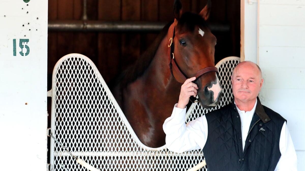 Trainer Richard Mandella looks on with Omaha Beach on May 2 after the horse was scratched from the Kentucky Derby.