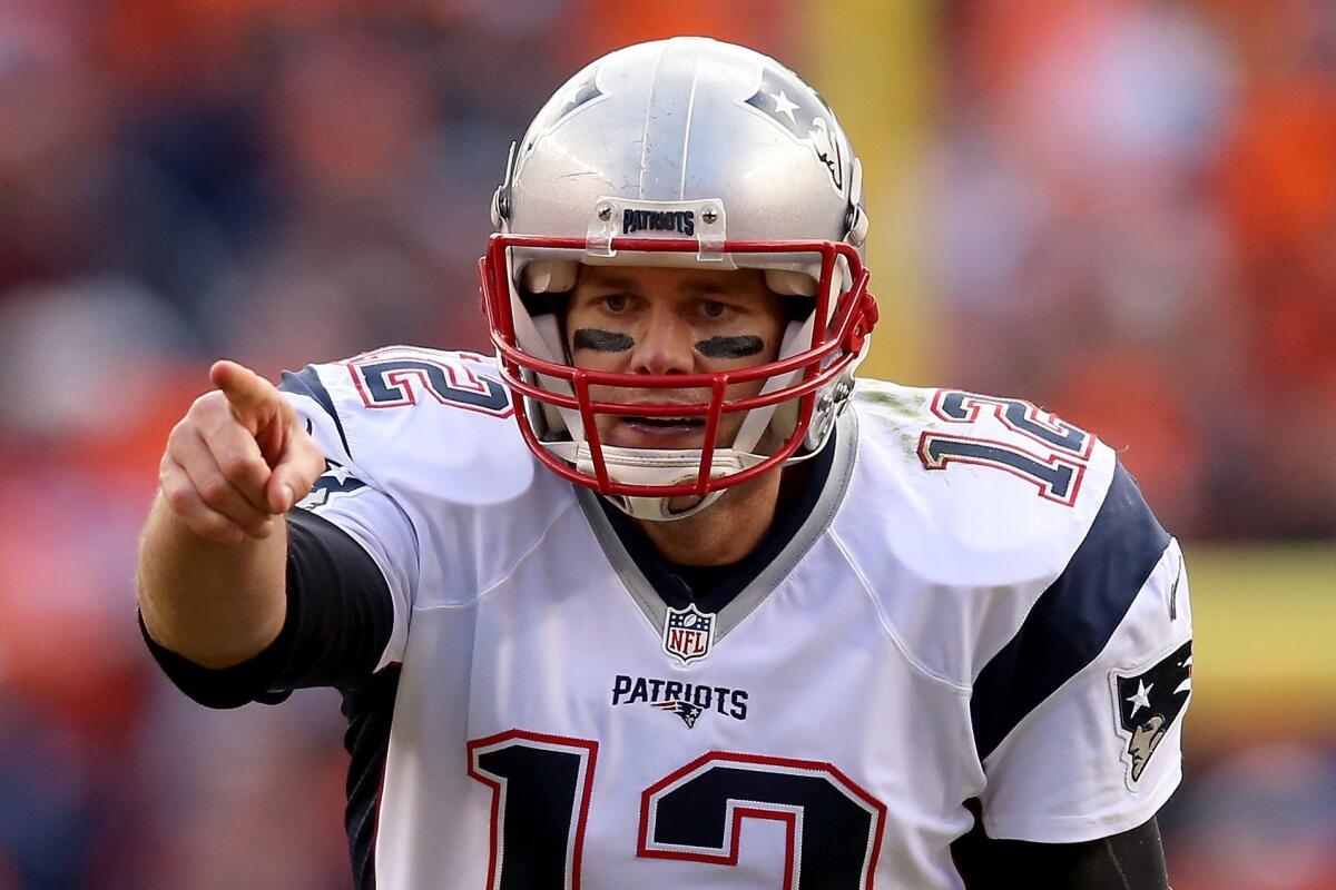 New England quarterback Tom Brady plays against the Broncos in Denver on Jan. 24.