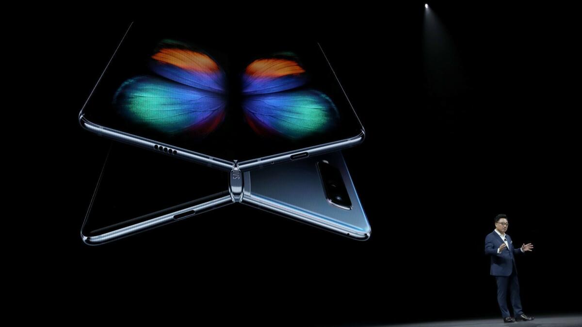 DJ Koh, president and CEO of the IT and mobile communications division of Samsung Electronics, announcing the new Samsung Galaxy Fold smartphone in February.