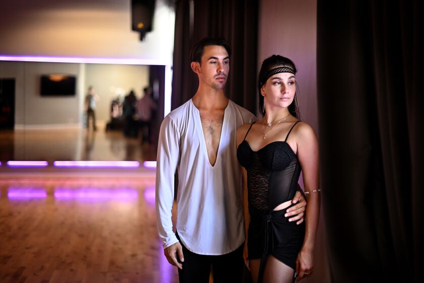 Los Angeles, California April 10 2022- Ukrainain refugee and ballroom dancer Kateryna stands with her boyfriend Nikolas Constantine (double check spelling) at Aesthetic Studios in Los Angeles. Kateryna was recently released from a Louisiana immigration detention center after she tried to come into the U.S. with her U.S. citizen boyfriend to request protection from the war in her country. (Wally Skalij/Los Angeles Times)