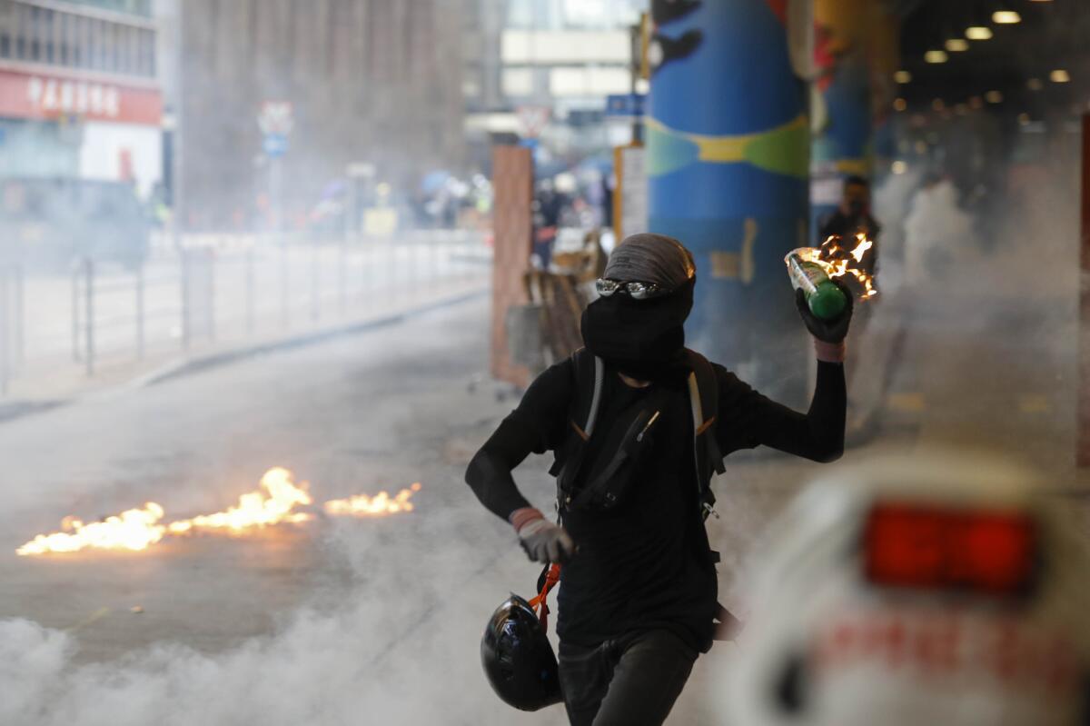 More violence grips Hong Kong ahead of China's National Day - Los Angeles Times