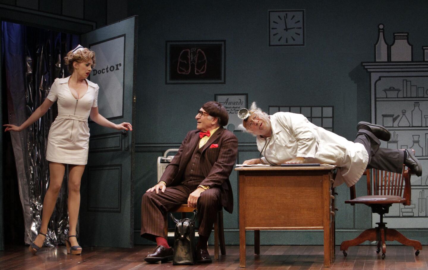 Annie Abrams, Judd Hirsch, center; and Danny DeVito in a scene from the revival of Neil Simon's "The Sunshine Boys" at the Ahmanson Theatre in Los Angeles.
