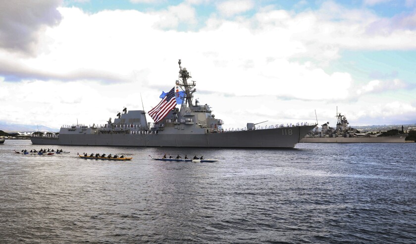 In this image provided by the US Navy, the U.S. Navy's newest guided-missile destroyer, the USS Daniel Inouye sails into Pearl Harbor on Nov. 18, 2021, ahead of its commissioning ceremony on Dec. 8, 2021. The destroyer named for the late Medal of Honor winner and longtime U.S. Daniel Inouye, D-Hawaii, conducted a tour through the Hawaiian Islands to pay tribute to his memory and legacy. (Spc. 2nd Class Aja Bleu Jackson/US Navy via AP)