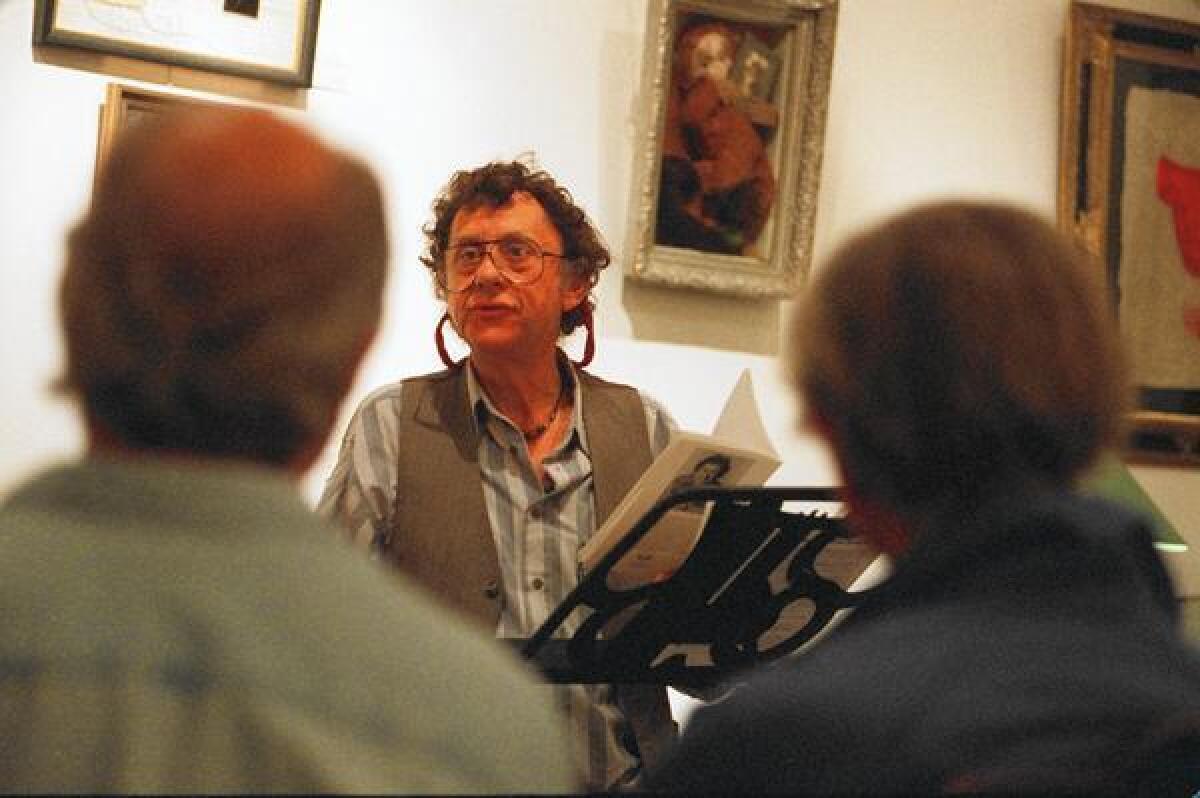 Steve Kowit, shown at a poetry reading at the Writing Center in San Diego, died April 2 at his home in Potrero.