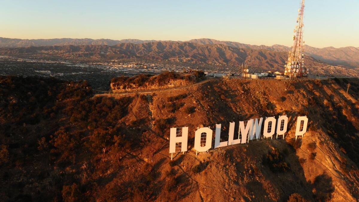 An aerial view of the Hollywood sign atop Mount Lee in Griffith Park.