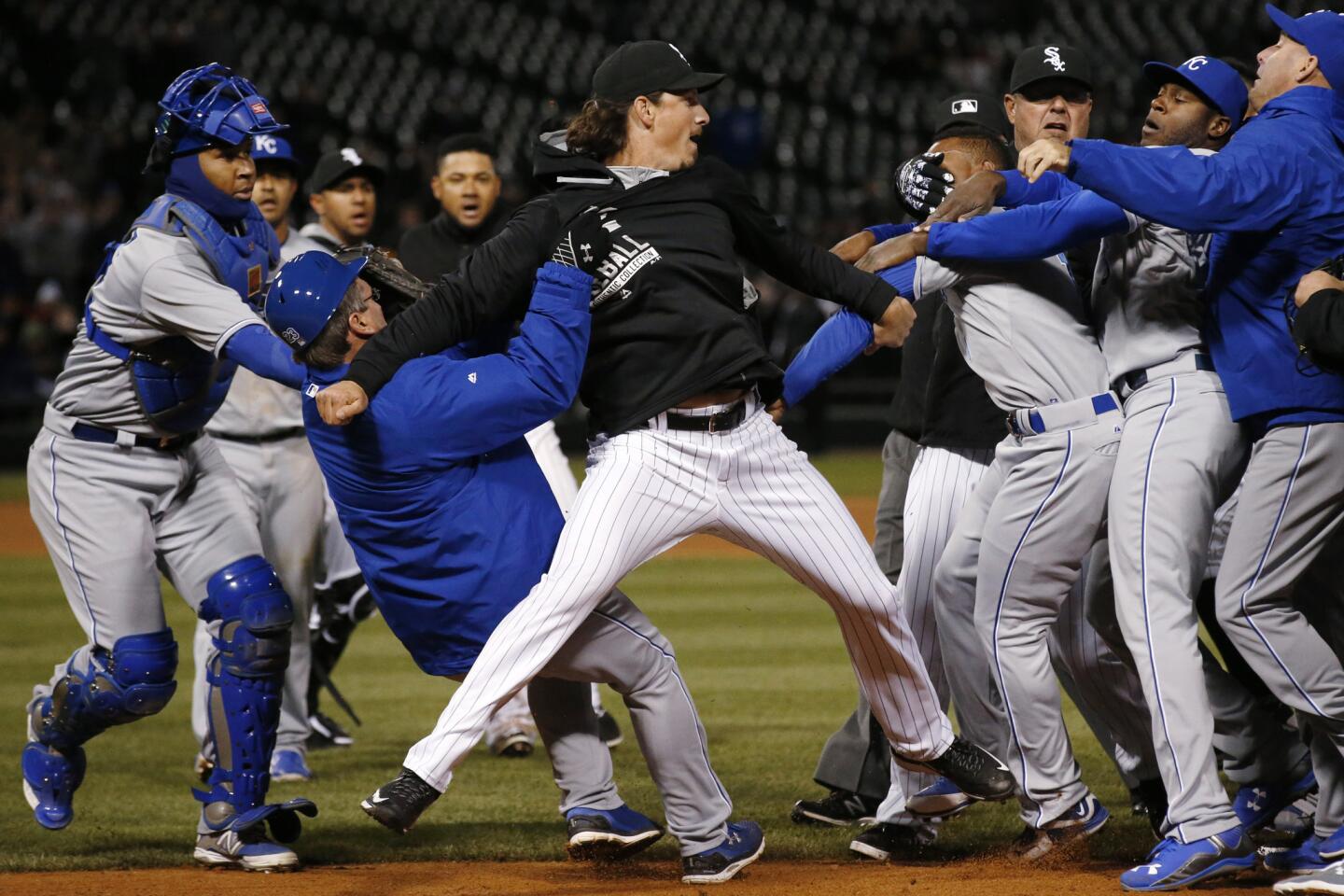 Jeff Samardzija fights with Royals players during the seventh inning.