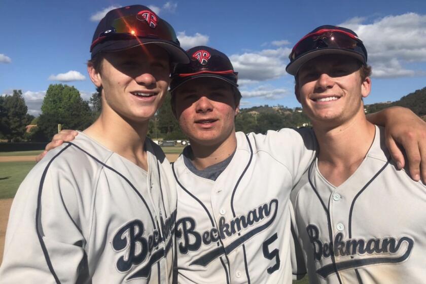 In 2018 at Beckman High, the McLain brothers Sean (left), Nick and Matt. 