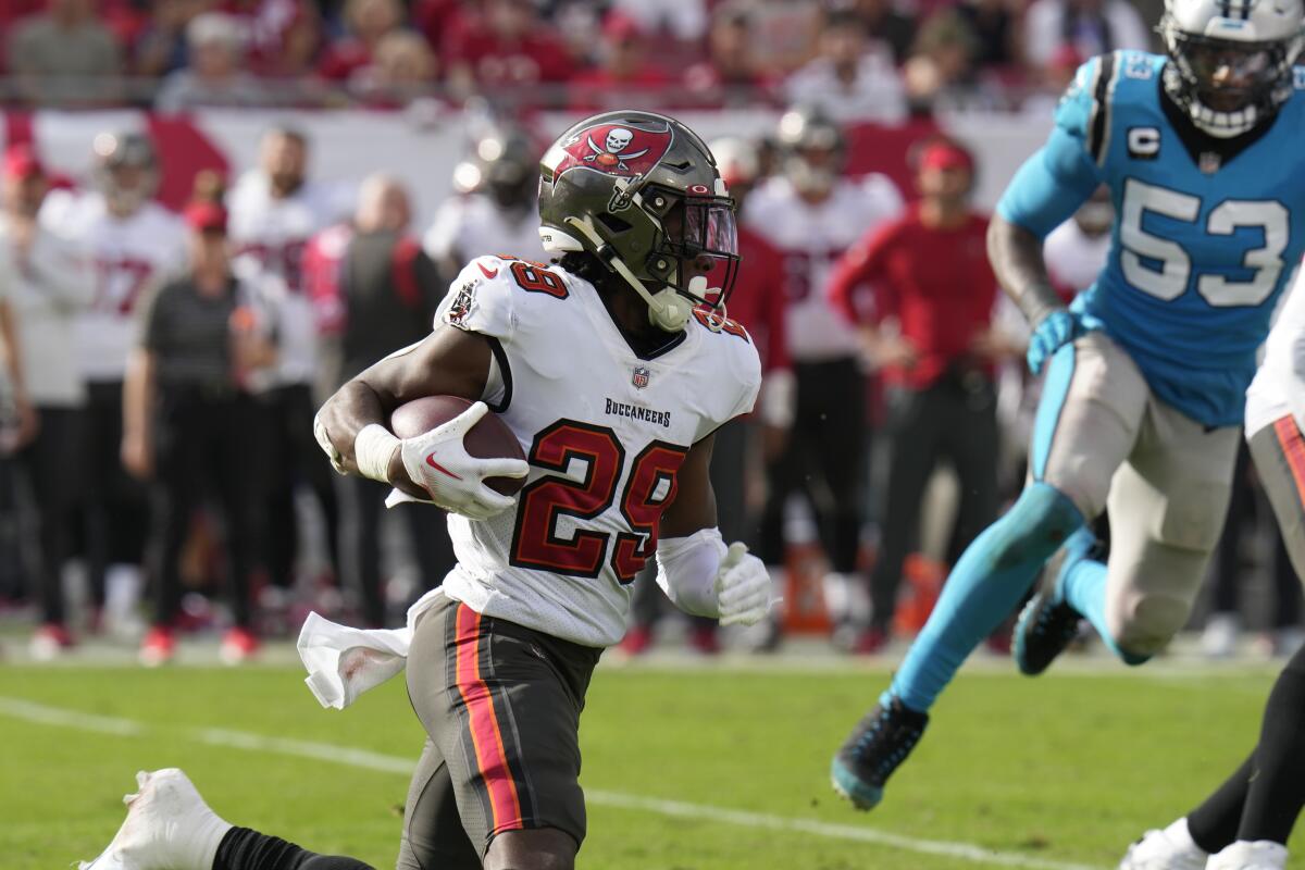 Tampa Bay Buccaneers running back Rachaad White rushes against the Carolina Panthers.